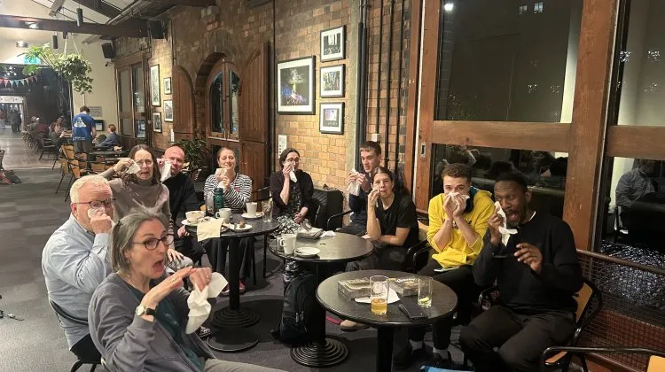 Deaf Conversations about Cinema event wiping tears away after a sad film