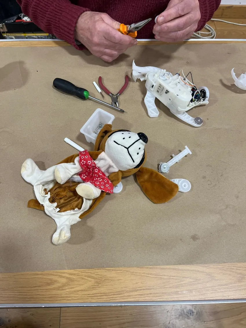 Toy dog being repaired