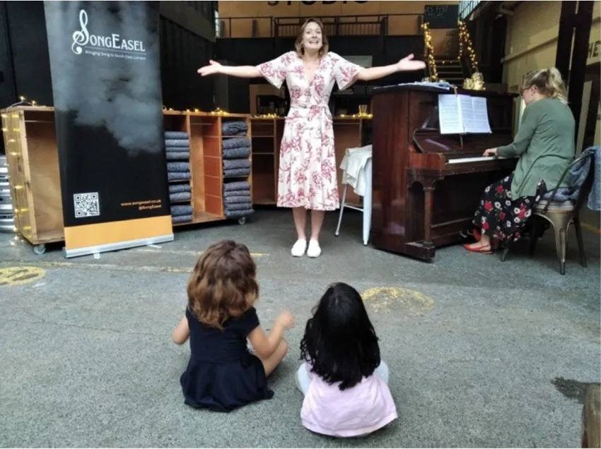 Children enjoying a SongEasel free pop up recital in a cafe in SE London
