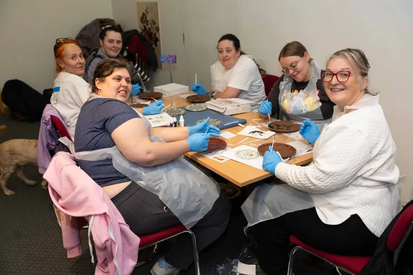 Monday Night Club for adults with learning disabilities or autism painting a chocolate plate workshop