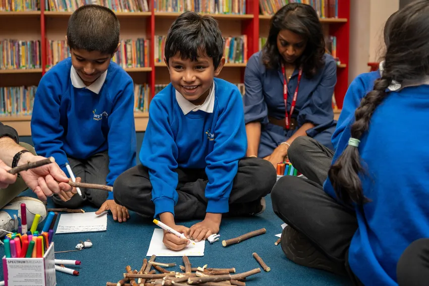 Children taking part in Chandran Foundation’s Art of Wellbeing programme, using creative activities to explore feelings, build confidence, strengthen resilience and develop positive peer connections in a safe, supportive school setting.