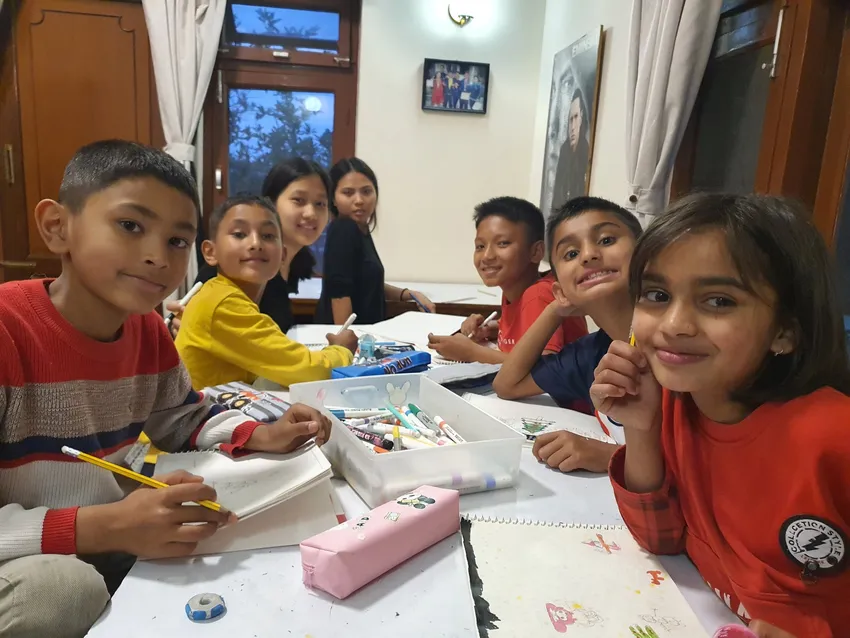 Children working and drawing together