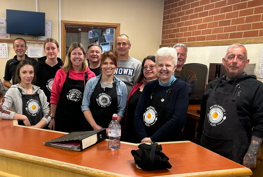 Image shows the Friday Team behind the counter in the cafe.