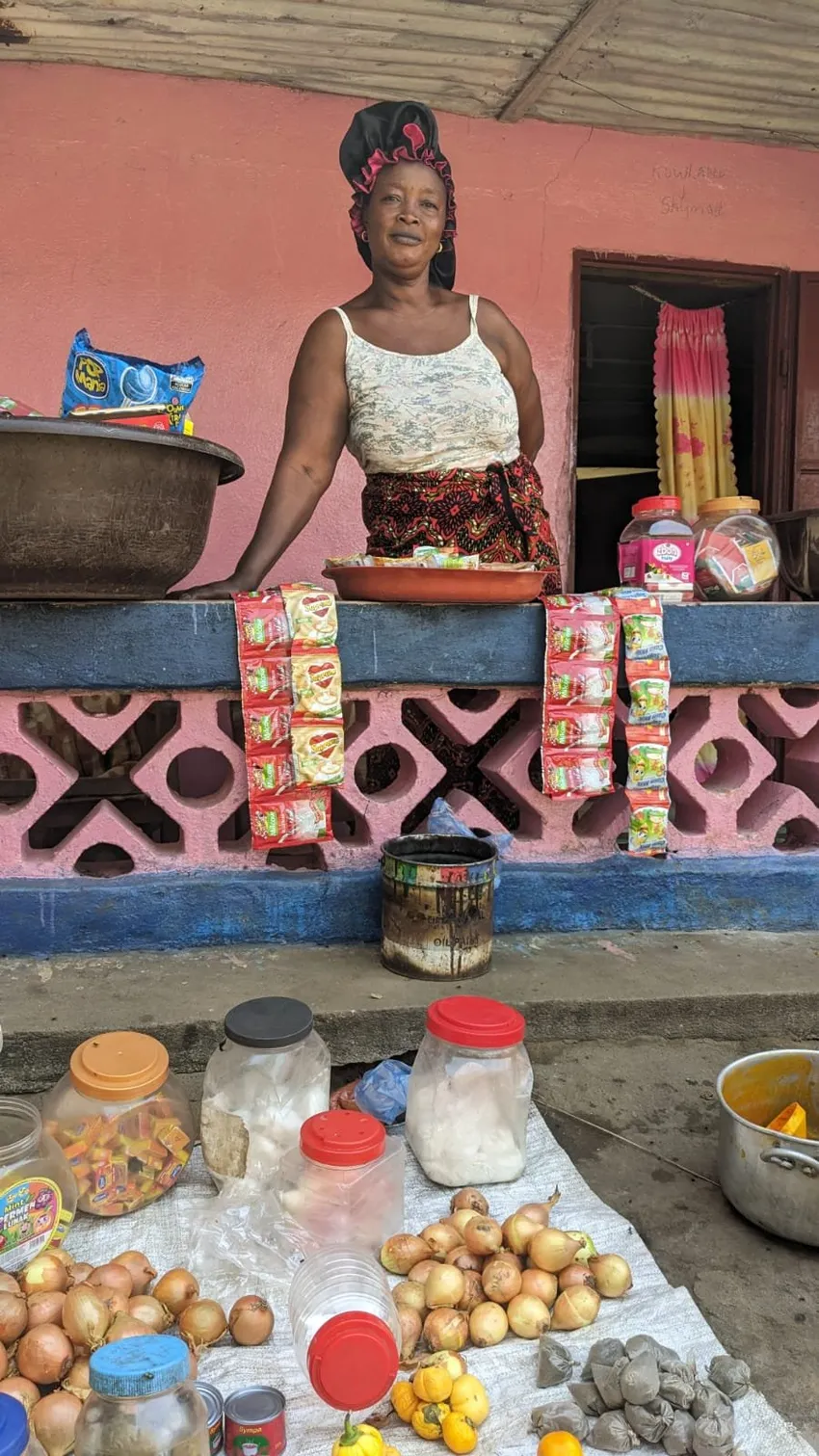 Woman shop outside house