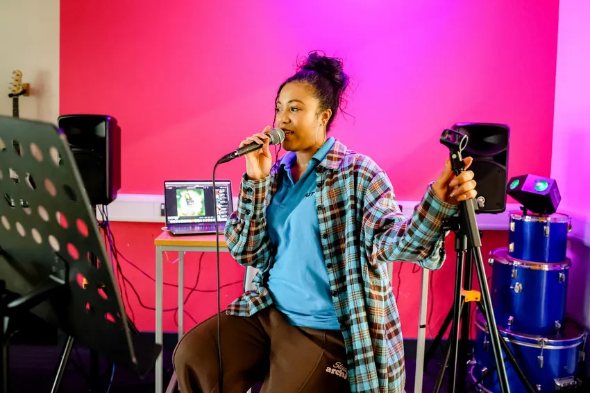 A young singer at the Future Youth Zone in Dagenham