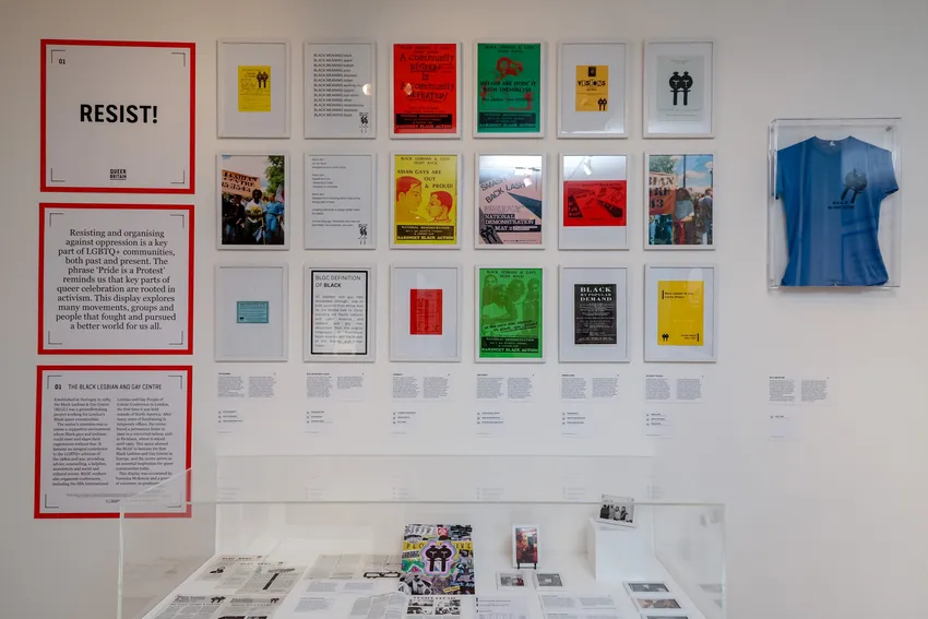 A display showing posters and a t-shirt from the Black Lesbian and Gay Centre