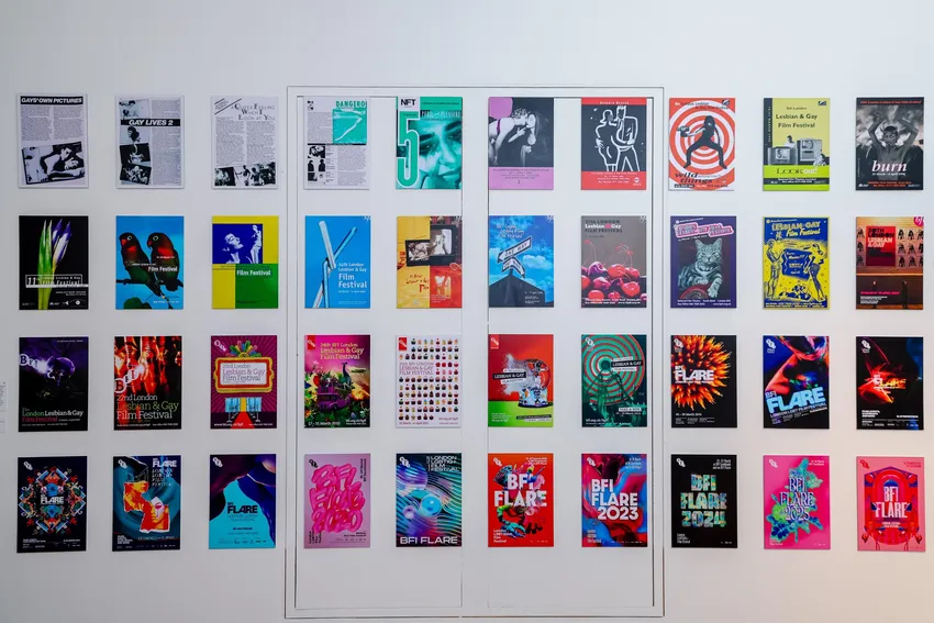 A display of various posters showing the artwork from 40 Years of the BFI Flare film festival